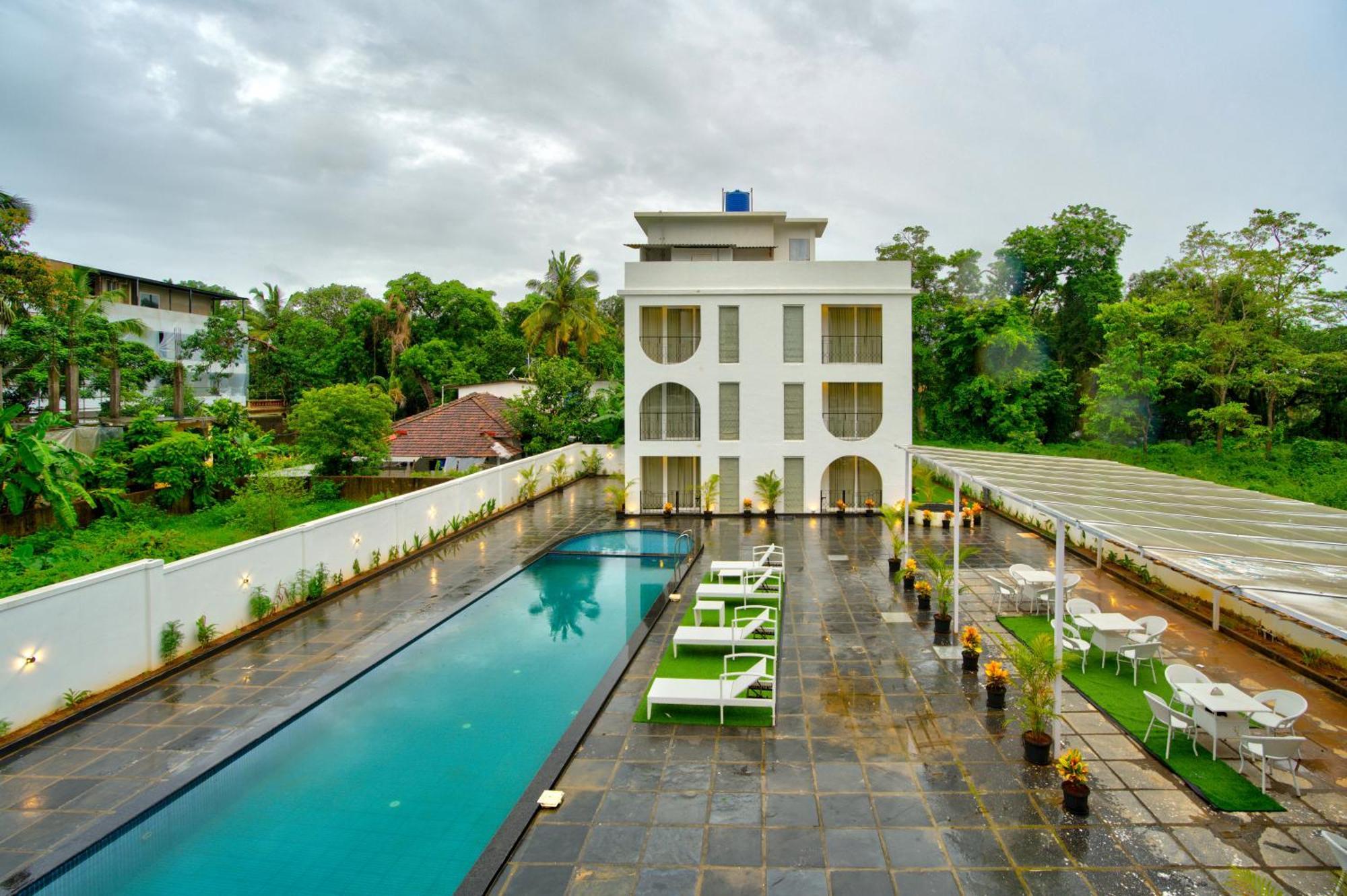 Goa Courtyard By The Porto Arpora Hotel Baga Eksteriør billede