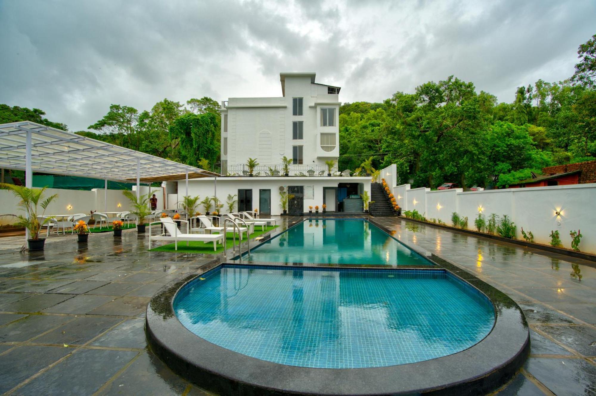 Goa Courtyard By The Porto Arpora Hotel Baga Eksteriør billede