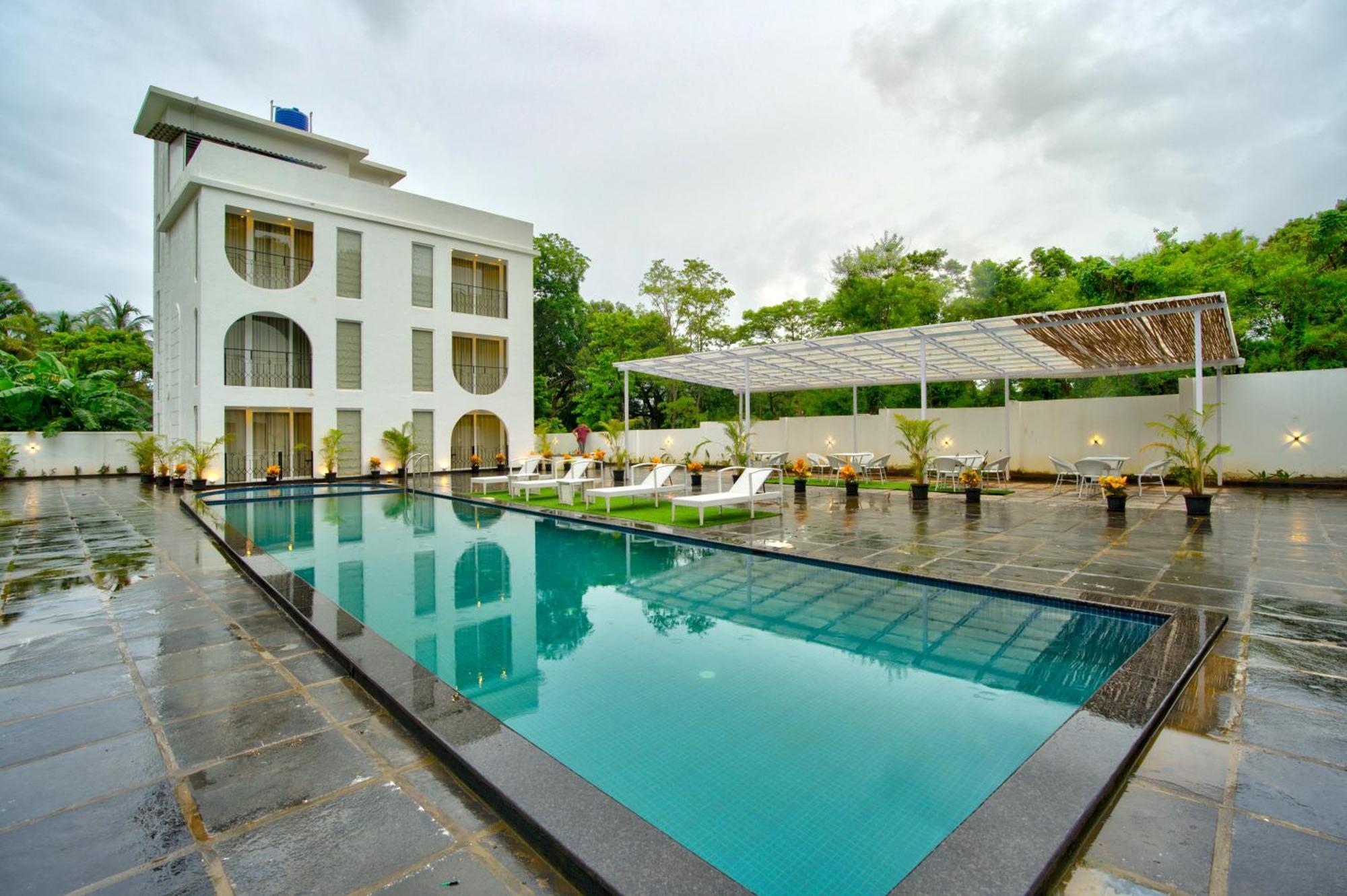 Goa Courtyard By The Porto Arpora Hotel Baga Eksteriør billede