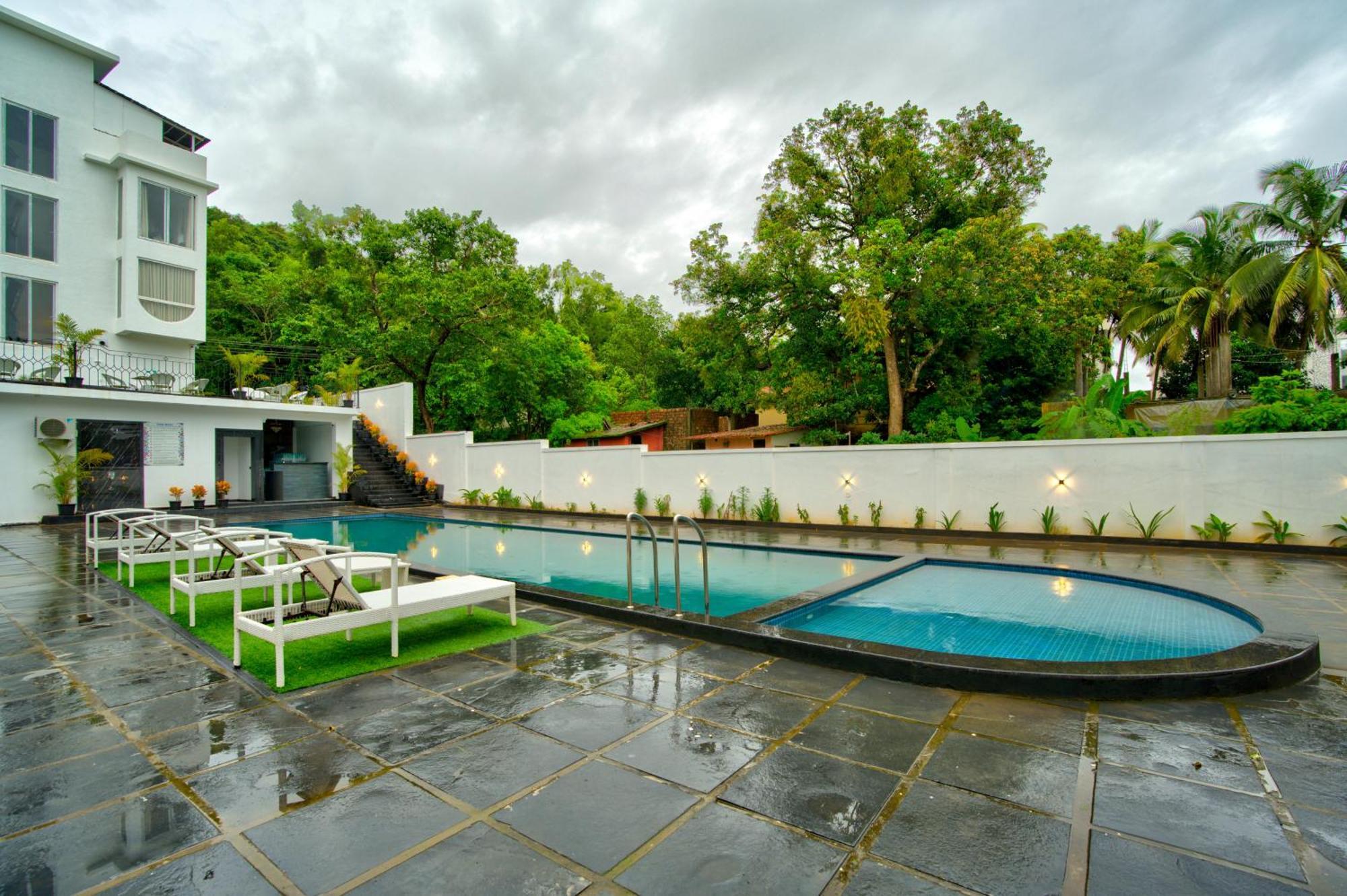 Goa Courtyard By The Porto Arpora Hotel Baga Eksteriør billede
