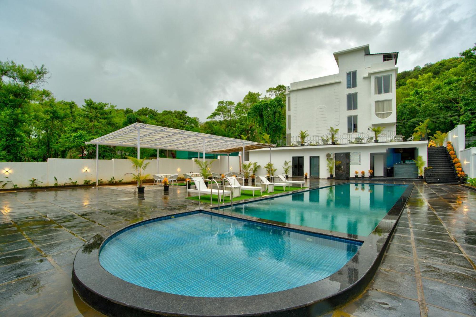 Goa Courtyard By The Porto Arpora Hotel Baga Eksteriør billede